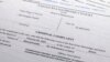 The criminal complaint against Jack Teixeira is photographed April 14, 2023. The Massachusetts Air National Guard member appeared in court on Friday in Boston, accused in the leak of highly classified military documents.