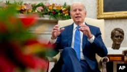 FILE — U.S. President Joe Biden speaks in the White House, Nov. 30, 2023. During a mid-January 2024 meeting with congressional leaders meant to underscore how desperately Ukraine needs funding, Biden said he was ready for a "big deal on the border."