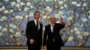 California Governor Gavin Newsom, left, stands next to Beijing Party Secretary Yin Li during a meeting in Beijing, Oct. 26, 2023. Newsom was on a weeklong tour of China.