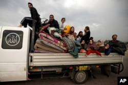 Palestinians flee the Israeli ground offensive in Khan Younis, Gaza Strip, Dec. 27, 2023.