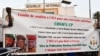 Des partisans de l'Alliance des États du Sahel (AES) brandissent leur bannière alors qu'ils célèbrent le départ du Mali, du Burkina Faso et du Niger de la Communauté économique des États de l'Afrique de l'Ouest (CEDEAO), à Niamey, le 28 janvier 2024. (Photo HAMA BOUREIMA / AFP)