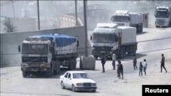 Օգնության բեռնատարների շարասյունը 2024 թվականի ապրիլի 9-ին Ռաֆահ անցակետից շարժվում է դեպի Գազա