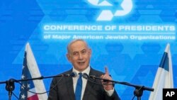 FILE — Prime Minister Benjamin Netanyahu speaks during a gathering of Jewish leaders at the Museum of Tolerance in Jerusalem, Feb. 18, 2024.
