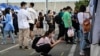 College Graduates in China Work Two Jobs to Make a Living