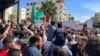 Protesters gather for a show of solidarity with Palestinians in Gaza, near Israel's embassy in Amman, Jordan, Oct. 7, 2023.