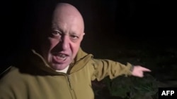 Yevgeny Prigozhin addresses the Russian army's top brass at an undisclosed location, in this video grab taken from a handout footage posted on May 5, 2023, on the Telegram account of the press-service of Concord.