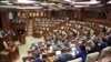 Dorin Recean, Moldovan president's nominee for prime minister, makes an address during a session of parliament in Chisinau, Feb. 16, 2023. 