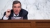 FILE - Senator Mark Warner, Democrat of Virginia and Chairman of the Senate Select Committee on Intelligence, holds a hearing n Capitol Hill in Washington, Apr. 14, 2021.