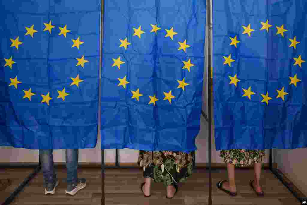 People vote in European and local elections in Baleni, Romania, June 9, 2024. 