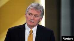 FILE - Kremlin spokesman Dmitry Peskov attends a press conference in Moscow, Russia, Dec. 14, 2023.
