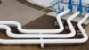 FILE - A view shows pipelines at an oil pumping station of Druzhba pipeline, in Adamowo, Poland, June 14, 2011.
