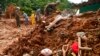 Children's toys lie in the mud where rescue workers look for bodies after a deadly landslide was triggered by heavy rains near Barra do Sahi beach in the coastal city of Sao Sebastiao, Brazil, Feb. 22, 2023. 