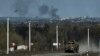A Ukrainian APC seen on the road on the frontline in Bakhmut, Donetsk region, April 9, 2023.
