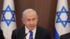Israeli Prime Minister Benjamin Netanyahu attends the weekly cabinet meeting in the prime minister's office Jerusalem, Feb. 19, 2023. Netanyahu said that Iran was responsible for a reported attack on an oil tanker last week. 