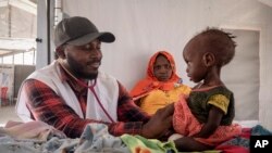 Sudanese children suffering from malnutrition are treated at a clinic in Metche Camp, Chad, near the Sudanese border, April 6, 2024. 