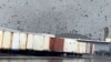 Puing-puing bangunan tampak berterbangan saat tornado menyapu Kota Montebello, California, pada 22 Maret 2023. (Foto: Raymond Rodriguez/via Reuters)