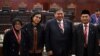 Menteri Sosial Tri Rismaharini, Menteri Keuangan Sri Mulyani, Menko Perekonomian Erlangga Hartarto, Menko Pembangunan Manusia dan Kebudayaan Muhadjir Effendy di Mahkamah Konstitusi di Jakarta, 5 April 2024. (Foto: Adek BERRY/AFP)