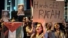 Demonstrators protest in solidarity with Gaza, outside the Israeli Consulate in Istanbul, May 6, 2024.