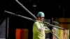 US employers added just 143,000 jobs last month, jobless rate slips to 4% 
