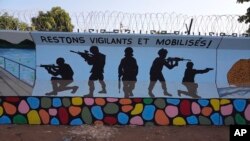 FILE - A mural is seen in Ouagadougou, Burkina Faso, on March 1, 2023. 