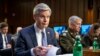 FBI director Christopher Wray looks through his notes before a Senate Intelligence Committee hearing to examine worldwide threats on Capitol Hill in Washington, March 8, 2023. 