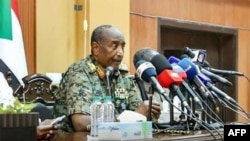 FILE - This handout image posted on the Sudanese Armed Forces's facebook page on Aug. 24, 2024, shows army chief General Abdel Fattah al-Burhan giving a press conference in Port Sudan, in the Red Sea state.