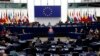 European Commission President Ursula von der Leyen, center, speaks during a commission on Russia's escalation of its war of aggression against Ukraine, at the European Parliament, Wednesday, Oct. 5, 2022, in Strasbourg, eastern France. (AP Photo/Jean-Fran