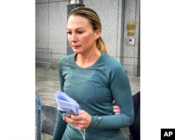 Olga Shriki, 42, of Jersey City, NJ, leaves Manhattan federal court after she was released on $2 million bail, Sept. 29, 2022, in New York.