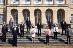 EU's Economy Commissioner Paolo Gentiloni, Eurogroup President Paschal Donohoe, World Bank President David Malpass, and G7 finance ministers meeting at Lancaster House in London, Britain, June 5, 2021.