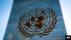 FILE - The symbol of the United Nations is displayed outside the Secretariat Building on Feb. 28, 2022, at the United Nations headquarters in New York.