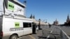 FILE PHOTO: Vehicles of Russian state-controlled broadcaster RT are seen in Red Square in central Moscow