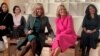 U.S. first lady Jill Biden, center right, and visiting French first lady Brigitte Macron, center left, take questions from students at Planet Word Museum in Washington on Dec. 1, 2022. 