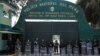 FILE - Police stand guard outside the prison where ousted Peruvian leader Pedro Castillo is being held, in Lima, Peru, Dec. 9, 2022. 