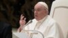 FILE - Pope Francis delivers his speech during his weekly general audience in the Pope Paul VI hall at the Vatican, Jan. 4, 2023.