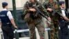'Man in the Hat' Brussels Bombing Suspect Taken to France to Face Charges