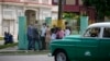 Diplomats from several countries wait outside the court building where a trial is going on for Cuban artists Luis Manuel Otero Alcantara and Maykel Castillo in Havana, Cuba, May 30, 2022. 