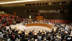 Dewan Keamanan PBB mengesahkan perjanjian nuklir Iran di markas besar PBB, Senin, 29 Juni 2015. (AP Photo/Mark Lennihan)