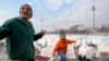 FILE - Children play where tents have been set up for earthquake survivors, in Kharamanmaras, Turkey, Feb. 10, 2023. A gate between long-feuding Turkey and Armenia has been opened for the first time in 35 years to bring in aid, according to the state-owned Anadolu news agency.