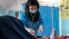 Some Afghan Female NGO Staff Resume Work Amid Taliban Ban