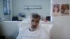 Georgia's jailed ex-President Mikheil Saakashvili is seen via a video link from a clinic during a court hearing to consider a request to release him or defer his six-year sentence for abuse of power over health concerns, in Tbilisi, Georgia, Feb. 1, 2023.