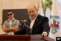 Israeli Prime Minister Naftali Bennett speaks at a press conference on an Israeli Defense Force base in Beit El in the West Bank, April 5, 2022.