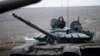 Russian troops take part in drills at the Kadamovskiy firing range in Russia's southern Rostov region, near the country's border with Ukraine, Dec. 14, 2021.