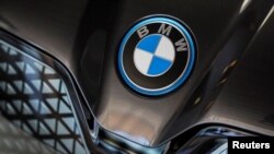 FILE - A BMW car logo is displayed during a media tour at the plant of German automaker BMW in San Luis Potosi, Mexico, Feb. 3, 2023.