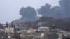 Asap mengepul di udara di Lviv, Ukraina barat, Sabtu, 26 Maret 2022. (Foto: AP)