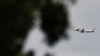 The plane of Brazilian President Jair Bolsonaro flies near Alvorada Palace in Brasilia, Brazil, Dec. 30, 2022.