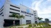FILE - A sign for the new Norwegian Cruise Line terminal is shown, April 7, 2021, in Miami. 