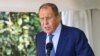 In this handout photo released by the Russian Foreign Ministry Press Service, Russian Foreign Minister Sergey Lavrov speaks during a news conference with Ugandan President Yowerei Museveni (not pictured) in Entebbe, Uganda, July 26, 2022. From Uganda, Lavrov heads to Ethiopia.