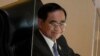 FILE - Thai Prime Minister Prayuth Chan-ocha reacts after a no-confidence vote against him was defeated at Parliament in Bangkok, July 23, 2022.