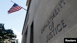 FILE - The headquarters of the United States Department of Justice in Washington, Aug. 29, 2020. 