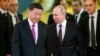 2019年6月5日,中国国家主席习近平和俄罗斯总统普京步入莫斯科克里姆林宫会谈大厅.